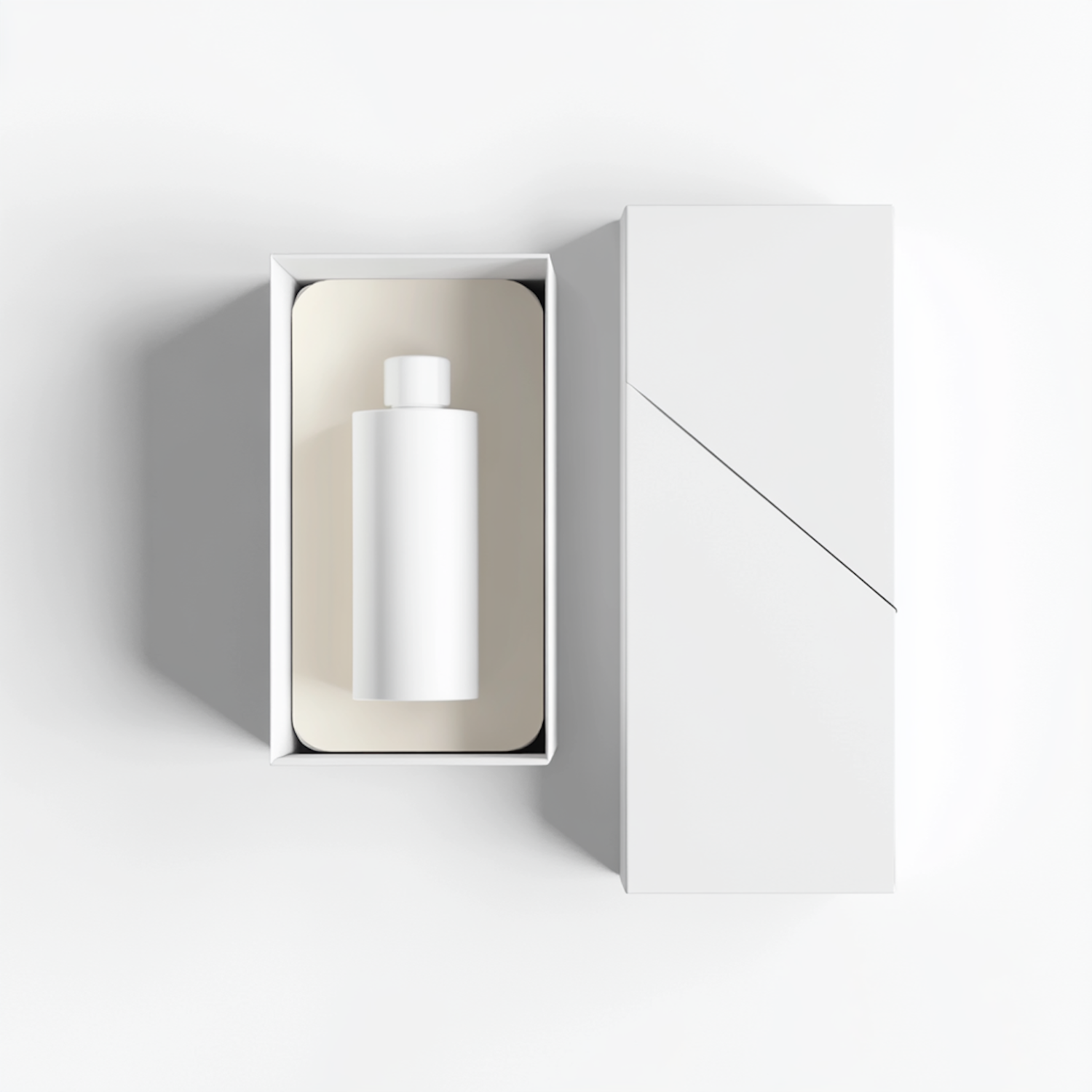 Minimal white packaging with a cylindrical bottle resting on a beige insert